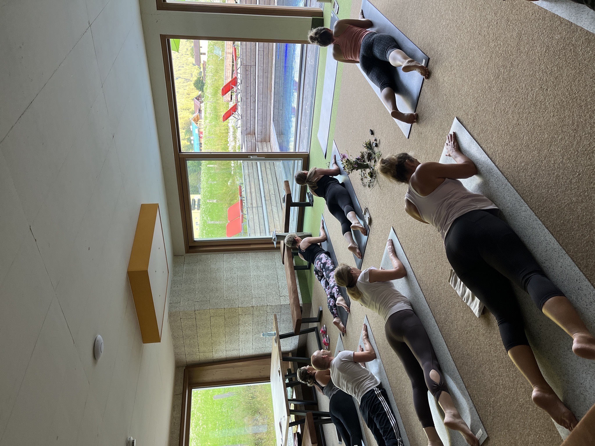 Group yoga session at a Zen & Go offsite