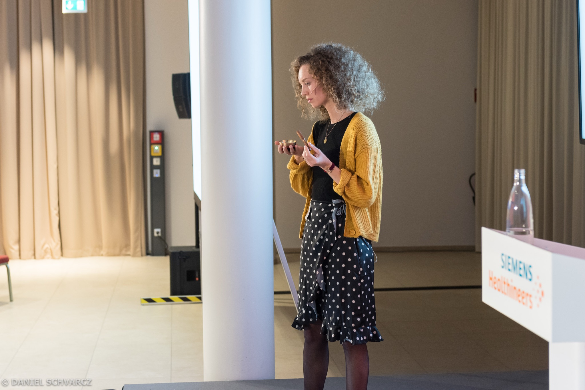 Sophie Bachmann on stage at a Siemens Healthineers event