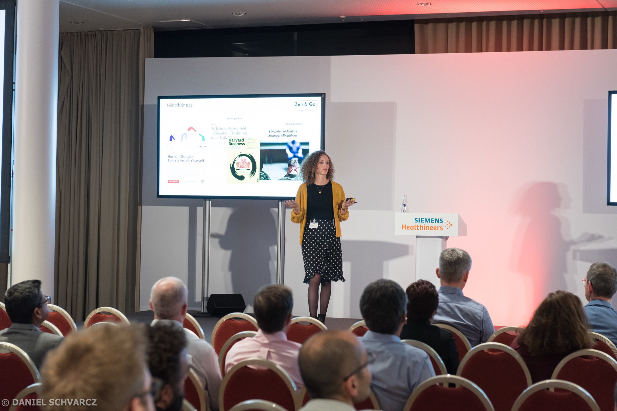 Sophie Bachmann speaking at a Siemens Healthineers conference