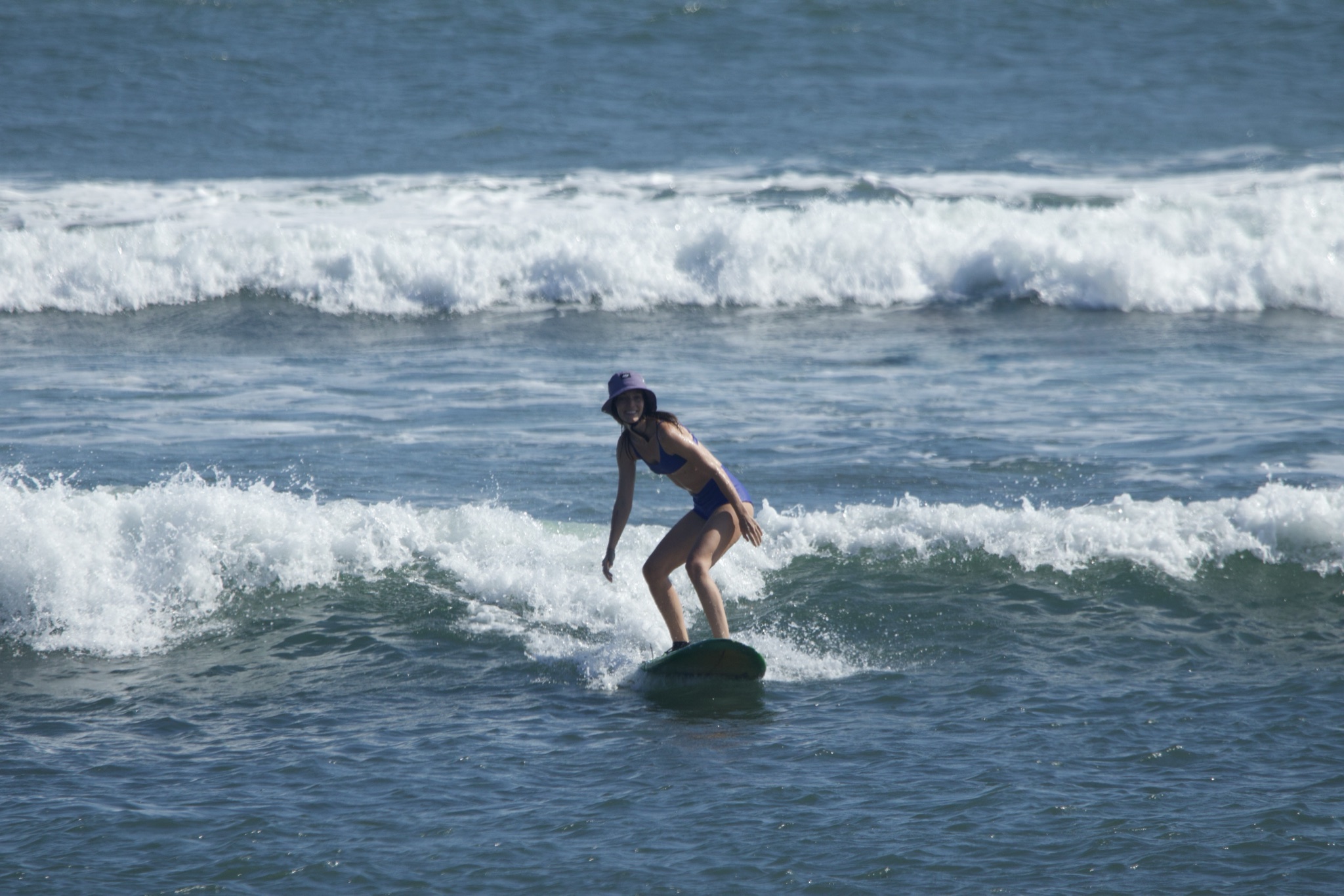 Sophie surfing in Bali